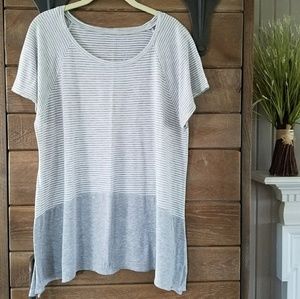 Grey and white striped tee with shark bite hemline